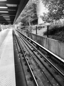 Black and white photo of a MARTA train station.