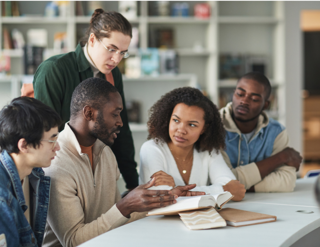 Picture of students listening to a mentor