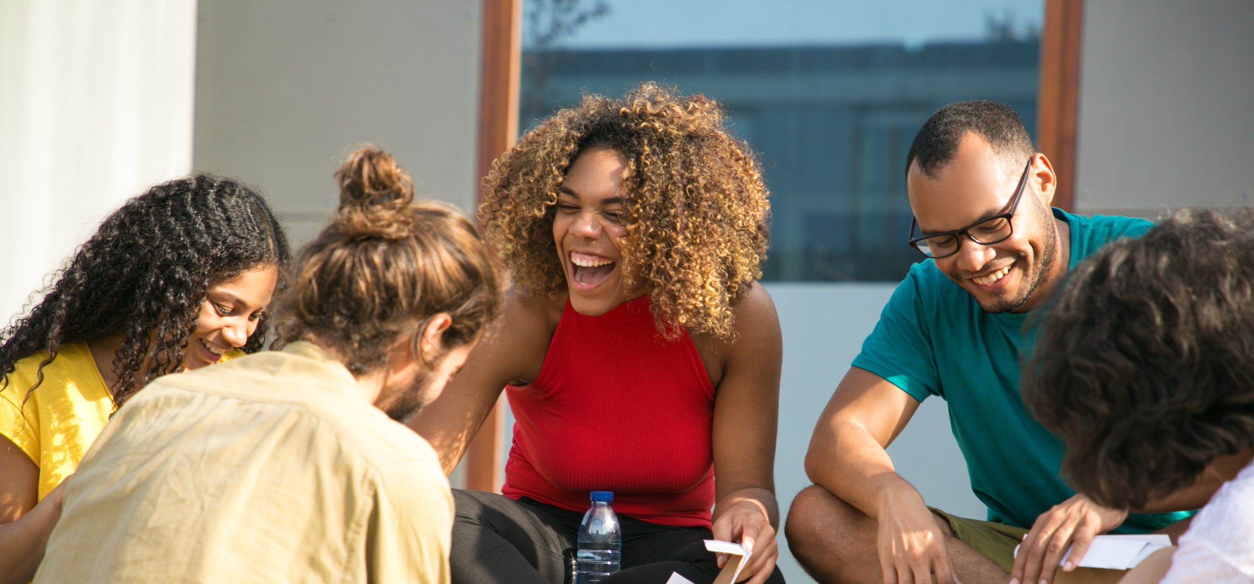 Happy, joyful friends talking and laughing